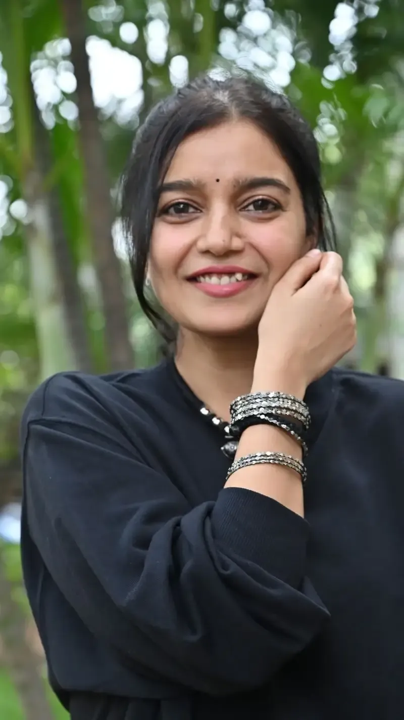 Actress Colors Swathi in Black Dress at Month Of Madhu Movie Press Meet